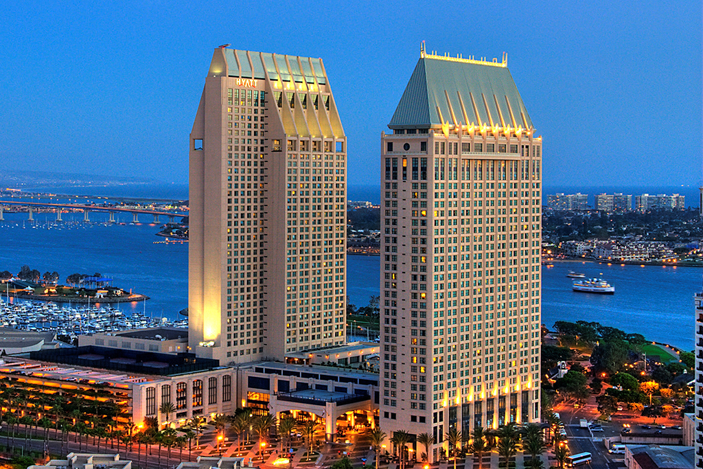 Photo of Manchester Grand Hyatt San Diego hotel at night time. 